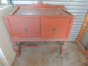 lot 12 image: Vintage diminutive English side board buffet 2 cabinet doors and tear drop handles 18x38x36 damage to top