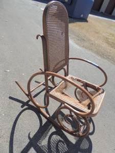 lot 21 image: Bentwood rocker with wicker seat and back (seat needs repair)