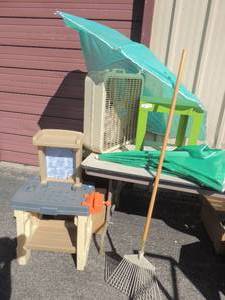 lot 122 image: Misc. Rake, fan, 2 umbrellas, plastic table and kids tool bench