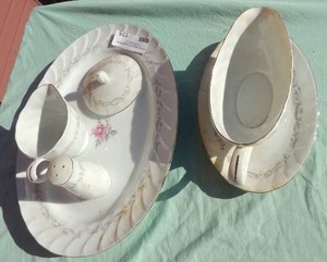 lot 125 image: Royal Swirl fine china japan- Oblong serving platter, gravy boat,  platter dish, sugar bowl top, pepper shaker and creamer