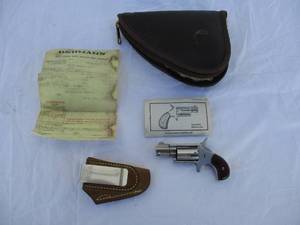 lot 15 image: NAA Mini 5-Shot 22-LR Revolver With Belt Clip Holster