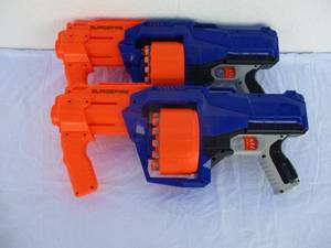 lot 22 image: 2-NERF (Display Model) SurgeFire Elite Blaster -- 15-Dart Rotating Drum, Slam Fire, With Official Nerf Elite Darts-Works