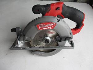lot 55 image: Milwaukee-M18 FUEL Battery Powered 7-14In.  Circular Saw- Untested- No Battery Or Charger