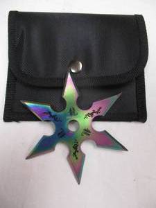 lot 114 image: 4 6-Point Double Edge SS Ninja Throwing Star In Sheath.