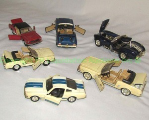 lot 135 image: Die cast Ford Mustangs and AC Cobra