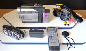 lot 66 image: VINTAGE PANASONIC MINI DV CAMCORDER W700X ZOOM - BATTERYCABLES & REMOTE