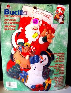 lot 123 image: Bucilla Santa and Snowman With Gifts  18 Felt Christmas Stocking Kit #84385 - FTH International Sales Ltd. NIP