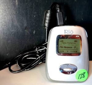 lot 128 image: Rio Carbon Silver 5GB Digital Media MP3 Player loaded w James Pattersons 7th Heaven - A Womens Murder Club Novel - TESTEDWORKS