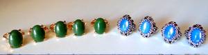lot 172 image: PRETTY HMS STAMPED ORNATE WOMENS RINGS (5X GREEN STONE) (4X BLUE CATS EYE STYLE)