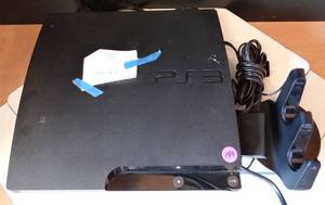 lot 199 image: WORKING PLAYSTATION 3 & CECH-ZDCIU CONTROLLER CHARGING STATION