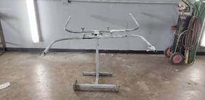 lot 40 image: Rolling Bumper Tree Paint Stand