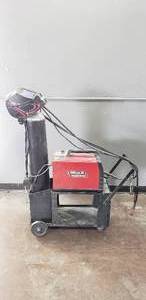 lot 58 image: Lincoln Electric Pro MIG 180 with Cart, Tank, and Accessories