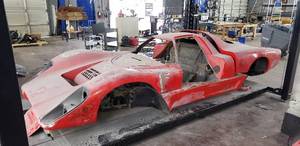 lot 2 image: McLaren M6GTManta Montague Coyote X Body (Hardcastle & McCormick), Frame, Side Panels, Doors, Windshield, Decals, Headlight Covers, Paint, and More