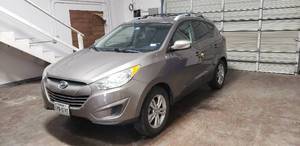 lot 19 image: 2012 Hyundai Tucson GLS, 97,133 Miles, Partial Leather Seats, Roof Rack, Very Clean Interior, New Battery, Alloy Wheels, Runs & Drives Great