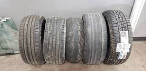 lot 91 image: Lot of 5 Tires, 1 is New - Buyer Takes All