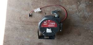 lot 132 image: Husky 50 Retractable Extension Cord Reel System