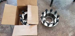 lot 143 image: 8 to 10 Lug Dually Adapter Set