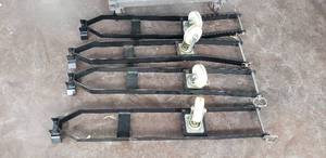 lot 200 image: Atlas Portable Caster Kit to Easily Relocate or Reposition your 4-Post Car Lift