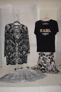 lot 218 image: Womens Clothes Karl Lagerfeld Beaded T-shirt, Silk Skirt, Knit Skirt, and Black & White Cupio Cardigan Sweater Size L