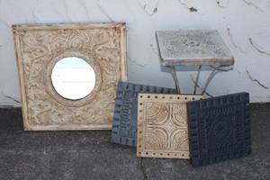 lot 15 image: Painted Aluminum Wall Dcor and small patio table