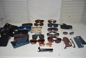 lot 44 image: Eyeglasses and cases Many different reading glasses and sunglasses