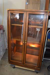 lot 103 image: Back Lighted Glass Front Wooden Bookshelves (some new light bulbs needed)
