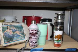 lot 53 image: River Raft Tube, Thermoses, and Pitcher