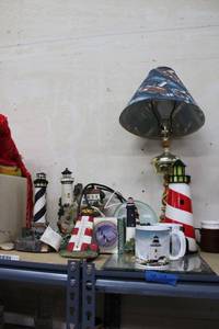 lot 67 image: Lighthouse Lot Table Lamps, Figurines and Mugs