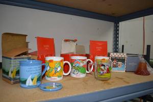 lot 85 image: Specialty Mugs and Avon Cologne Decanter