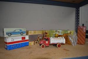 lot 86 image: Cast Iron Model Texaco Truck, Glass Avon After Shave Decanters