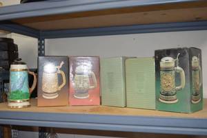 lot 100 image: Collection of Avon Steins - some with Colognes