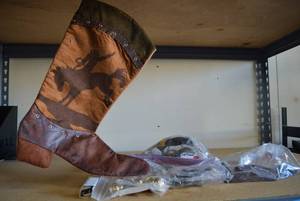 lot 366 image: Cowboy Stocking, Cabinet Pulls, Door Stoppers and Vintage Electric Iron