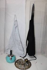 lot 384 image: Teapot, Tea Defusers, and Cooking Aprons