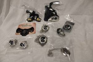 lot 440 image: Halloween skeleton cameo jewelry. Includes chokers, necklaces, pendants, earrings, plus