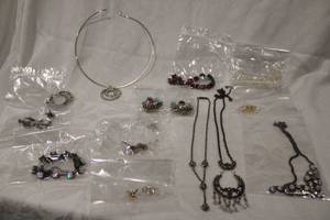 lot 432 image: Rhinestone and Crystal jewelry. Includes Necklaces, earring sets and loose glass beads. Generous quantity