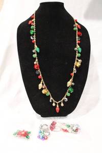lot 433 image: Holiday jewelry selection. Includes necklace, assorted adjustable earrings and brooch.
