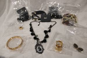 lot 441 image: Signed jewelry selection. Includes (3) carded Pier 1 necklaces, Napier, Monet, Marvella 3-strand pearl fashion necklace, KCR, Trifari plus