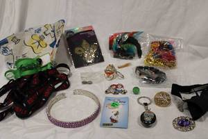 lot 453 image: Assorted jewelry and other selection. Includes lanyards, keychains, bracelets, misc.