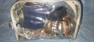 lot 11 image: Makeup bag of miscellaneous costume jewelry