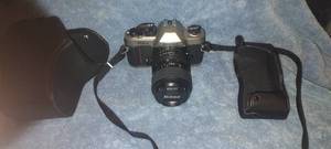 lot 19 image: Nikon 35mm camera with carry case