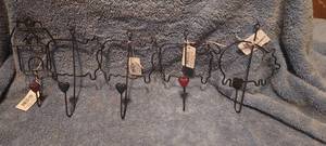 lot 29 image: Set of farm animal hangers