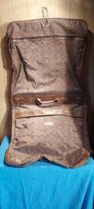 lot 48 image: GGG Garmet bag with leather trim and handles