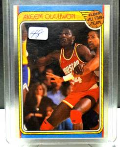 lot 48 image: Akeem Olajuwon Fleer All Star Team Card #126 - NMMT
