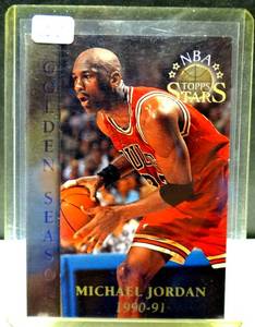 lot 210 image: 1996-97 Topps Stars Michael Jordan Golden Season #74 Bulls