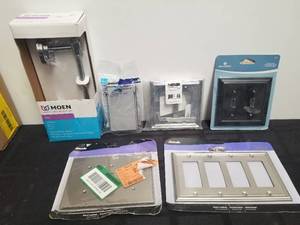 lot 55 image: Selection of wall plates and moen TP holder
