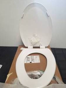 lot 69 image: Elongated Toilet seat by Swiss Madison