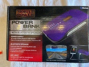 lot 32 image: Power bank 5200 mah lithium ION with blue tooth speaker LED light