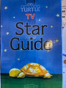 lot 19 image: Twilight turtle star guide NIP