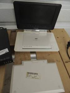 lot 69 image: Toshiba portable DVD player and in home DVD player