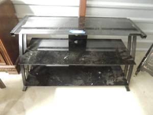 lot 73 image: Black glass & metal entertainment center